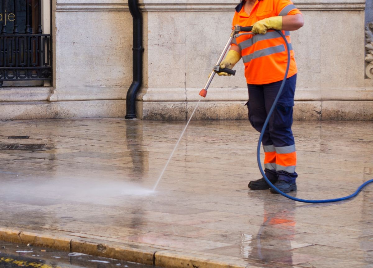 City workers - cleaning and washing of city streets